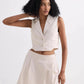 Cream sleeveless blazer vest and pleated mini skirt set for women's fashion