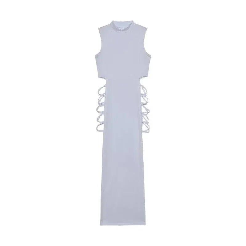 White sleeveless maxi dress with side lace-up detail, elegant women's fashion