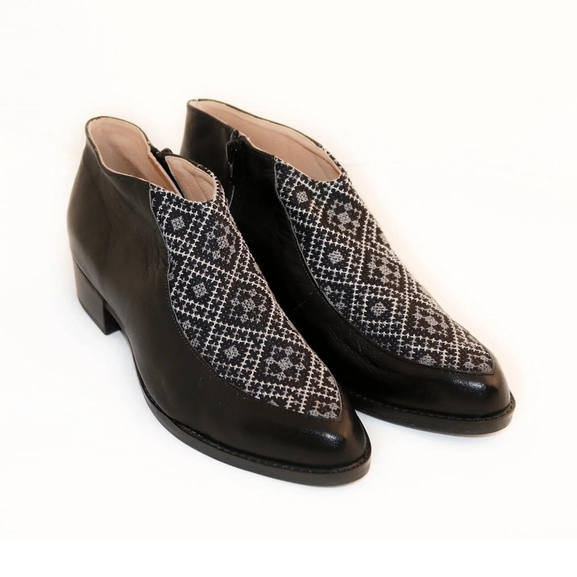 Black ankle boots with geometric pattern, low heel, women's fashion footwear
