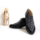Black women's ankle boots with geometric pattern, stylish fashion footwear