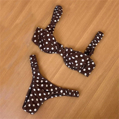 Brown polka dot bikini set with ruched straps, women's fashion swimwear on wood floor