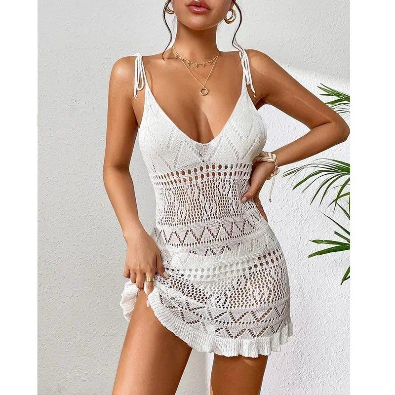White crochet beach cover-up dress with V-neck and ruffled hem, perfect for summer fashion