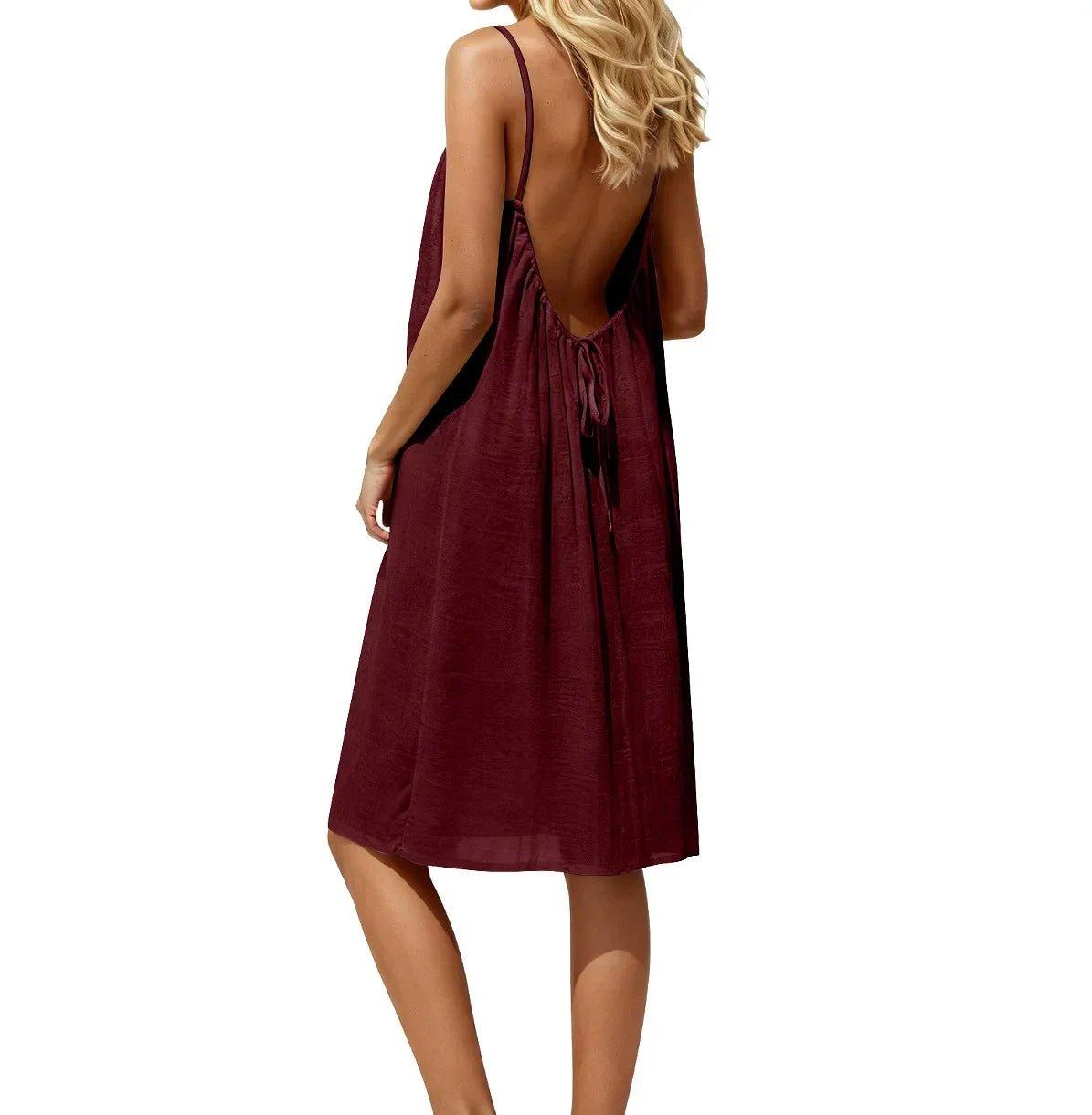 Women's burgundy backless sundress with tie detail, stylish summer fashion