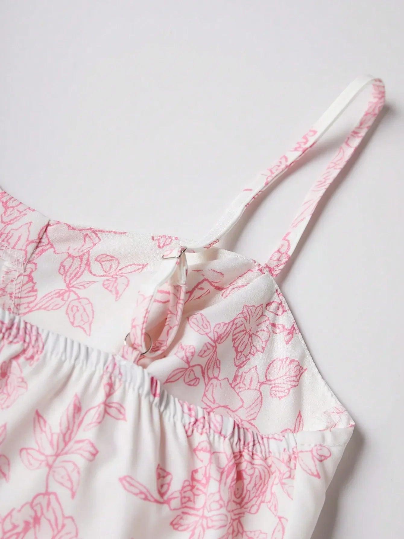 White floral print camisole with pink rose pattern and adjustable straps, women's fashion top