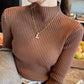 Brown ribbed turtleneck sweater for women, stylish fall fashion with gold necklace and belt