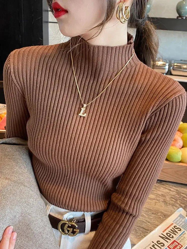 Brown ribbed turtleneck sweater for women, stylish fall fashion with gold necklace and belt