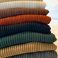 Stacked corduroy women's tops in neutral and earth tones for casual fashion