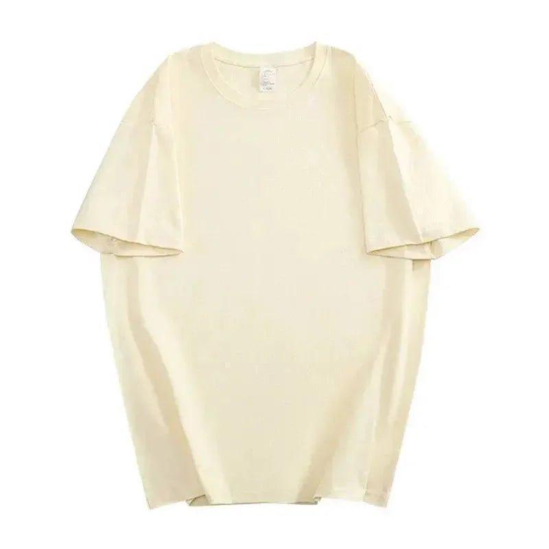 Cream oversized women's t-shirt with relaxed fit and short sleeves, ideal for casual fashion