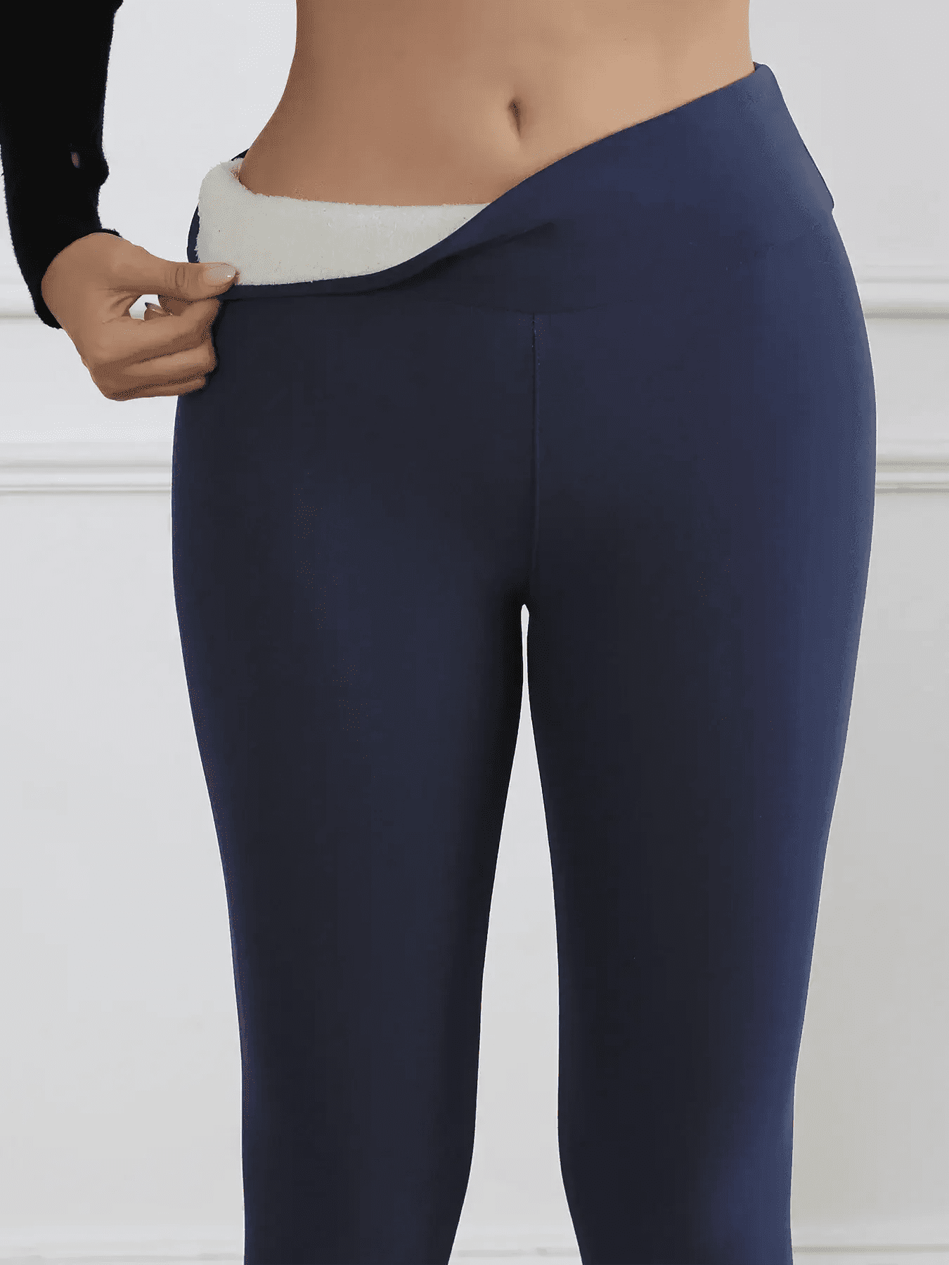 Navy blue women's fleece-lined leggings with high waist, cozy winter fashion