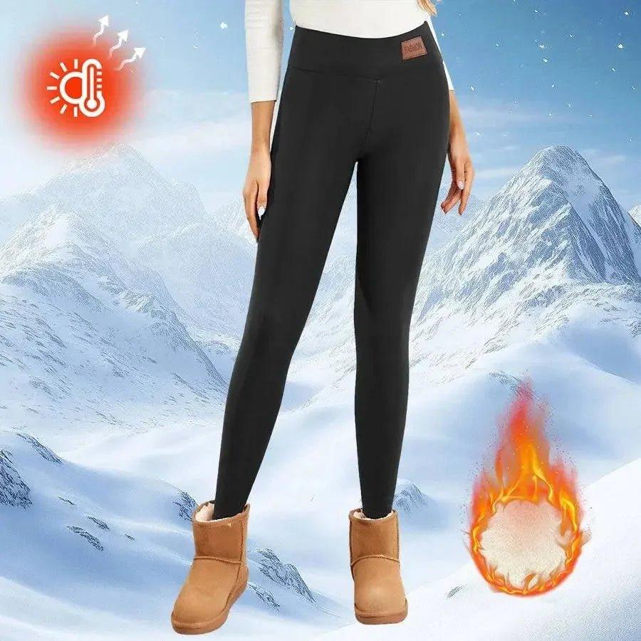 Women's black thermal leggings for winter, cozy warm fleece-lined, snow mountain backdrop