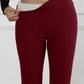 Burgundy women's fleece-lined leggings with high waist, cozy winter fashion wear