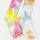 Colorful tie-dye crew socks for women, vibrant pink yellow blue orange patterns, fashion accessory
