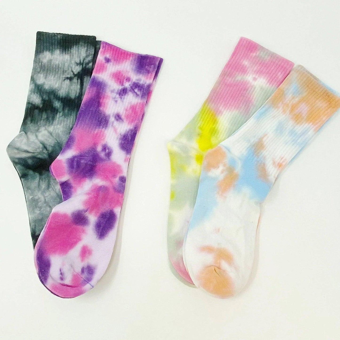 Tie dye socks in pink purple black and pastel rainbow patterns for women's fashion