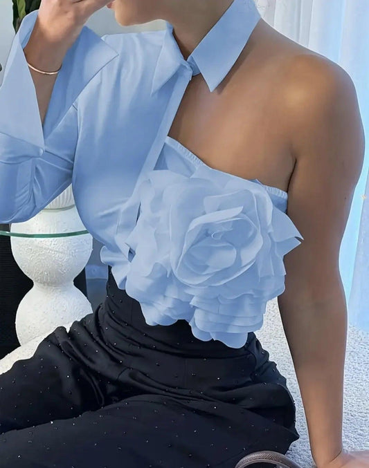 Light blue one-shoulder blouse with floral ruffle detail, paired with black embellished skirt for women's fashion