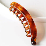 Tortoiseshell hair claw clip for women, stylish fashion accessory