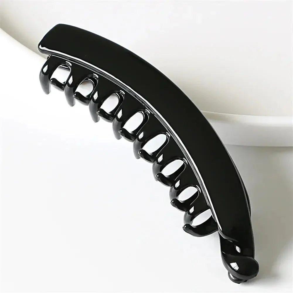 Black claw hair clip for women, sleek glossy finish, perfect for fashion hairstyles