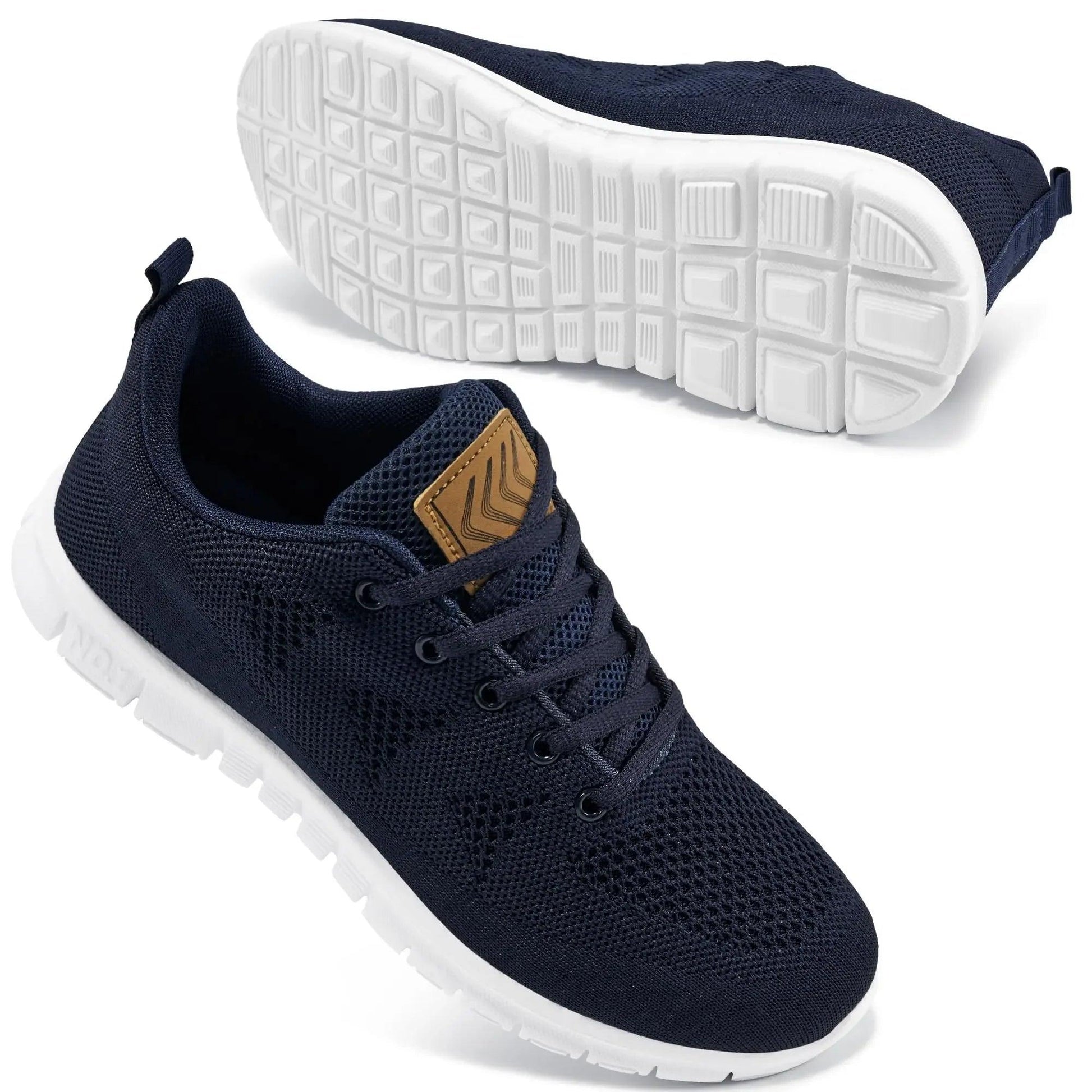 Navy blue women's mesh sneakers with white sole and tan accent, ideal for casual or athletic wear