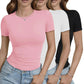 Women's pink, white, and black short sleeve t-shirts with ruched sides, paired with jeans for casual fashion.