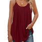 Burgundy women's sleeveless tank top with pleated front, paired with ripped jeans and gold jewelry