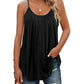Black pleated camisole top with thin straps, paired with ripped jeans for casual women's fashion