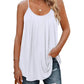White pleated camisole top with thin straps, paired with ripped jeans and gold jewelry for women's fashion