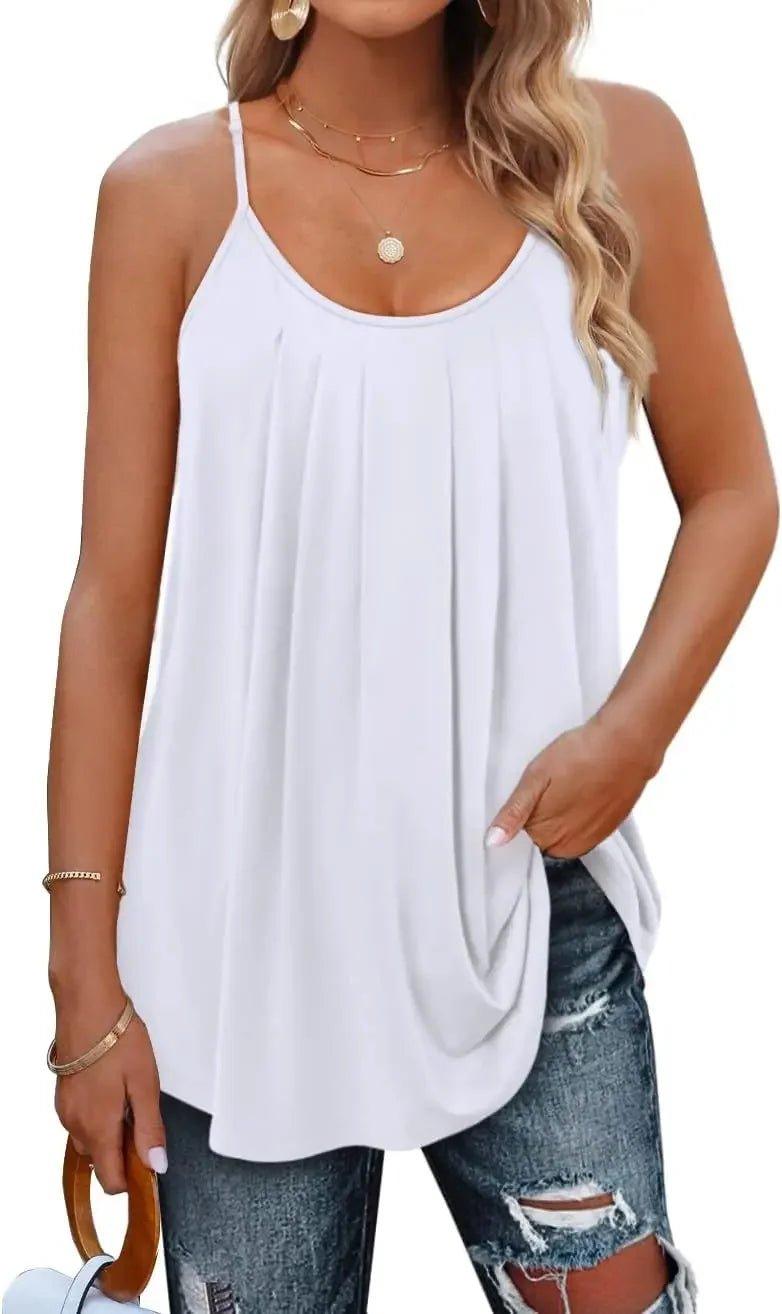 White pleated camisole top with thin straps, paired with ripped jeans for casual women's fashion