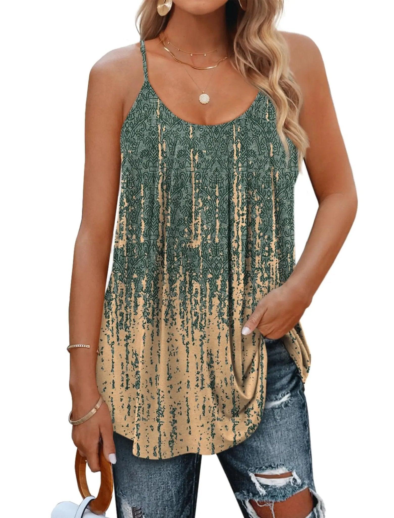 Green and beige patterned women's tank top with thin straps, paired with ripped jeans and gold jewelry