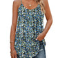Blue and white floral print women's tank top with spaghetti straps, paired with ripped jeans for casual summer fashion
