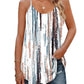 Women's striped cami top with abstract vertical print, paired with ripped jeans for casual fashion