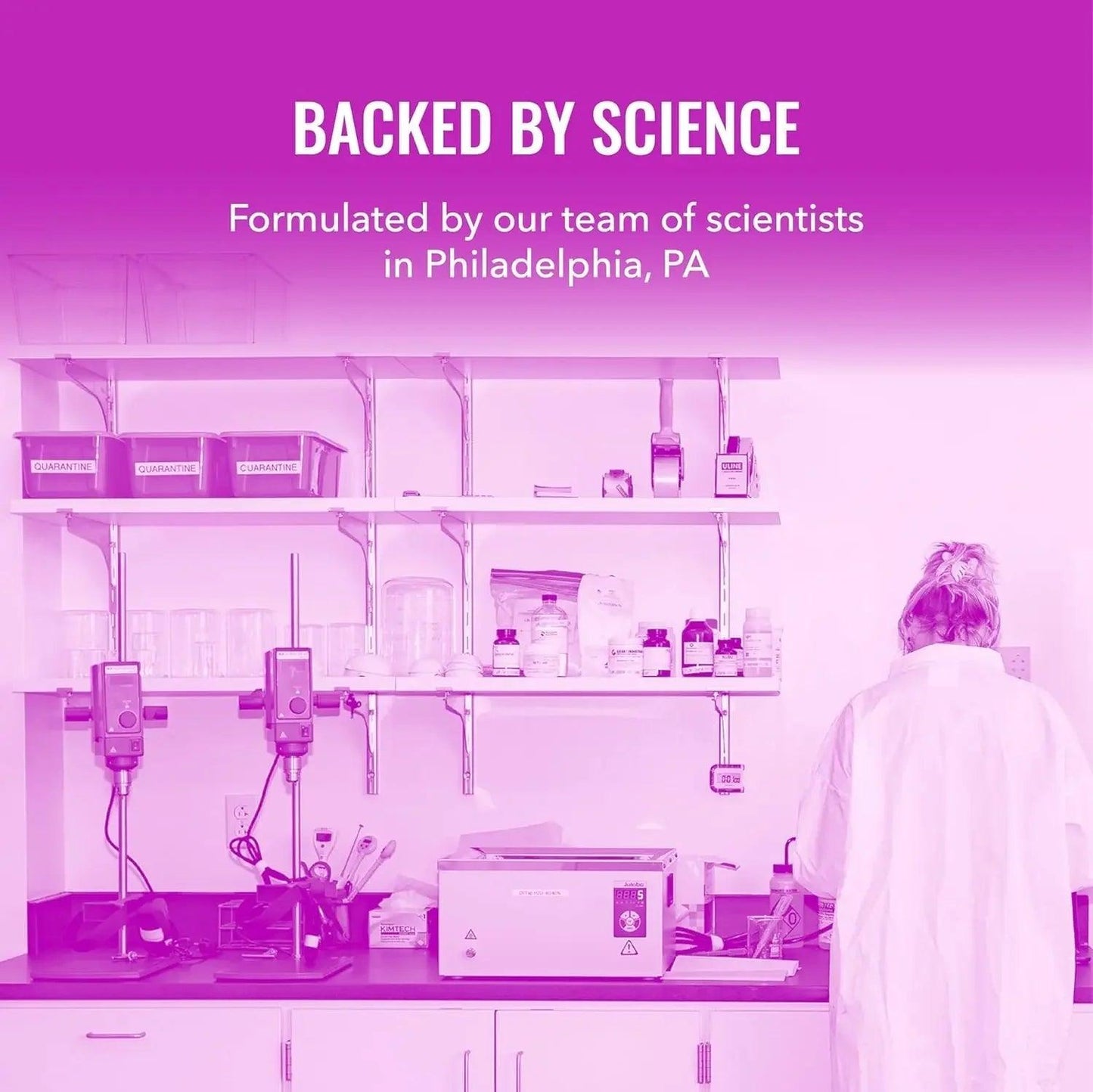 Scientist in lab coat formulating beauty products backed by science in Philadelphia lab