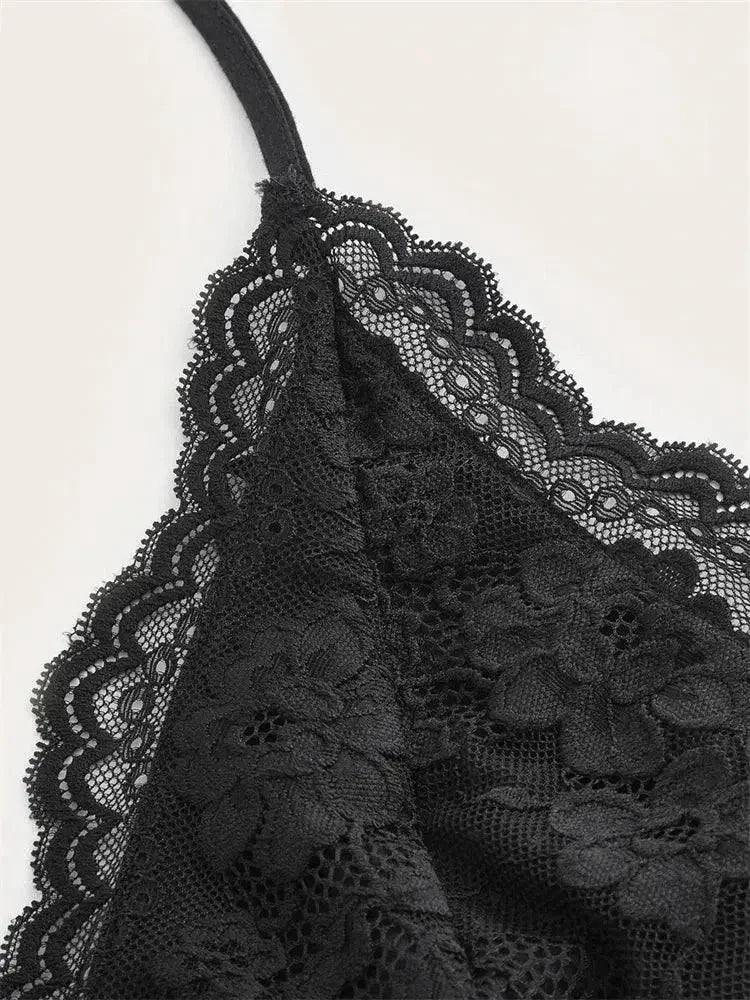 Black lace lingerie with floral detailing and scalloped edges, elegant women's fashion