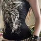 Black strapless top with silver angel wings and rose print, edgy fashion style