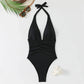 Black halter one-piece swimsuit with ruched waist, beach accessories, women's fashion