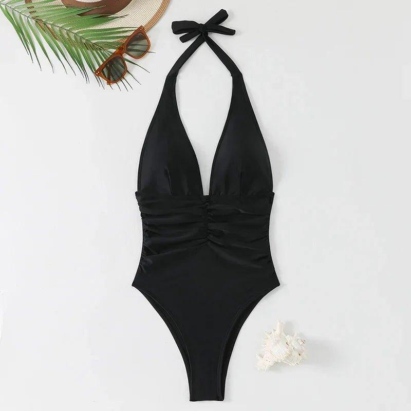 Black halter one-piece swimsuit with ruched waist, beach accessories, women's fashion