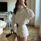 Woman in polka dot blouse and shorts with straw bag, stylish home fashion outfit