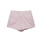 Pink polka dot women's fashion shorts with black dots, stylish summer wear