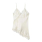 Elegant white lace camisole with delicate straps and scalloped hem, perfect for women's fashion