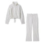 White polka dot women's fashion set with cropped top and matching pants