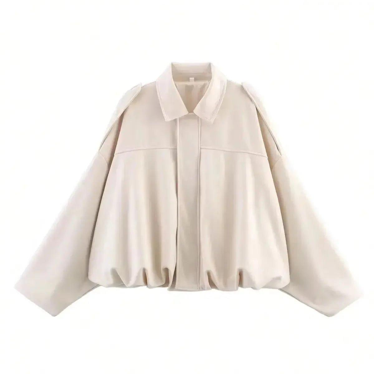 Cream women's oversized blouse with puff sleeves and collar, stylish fashion top