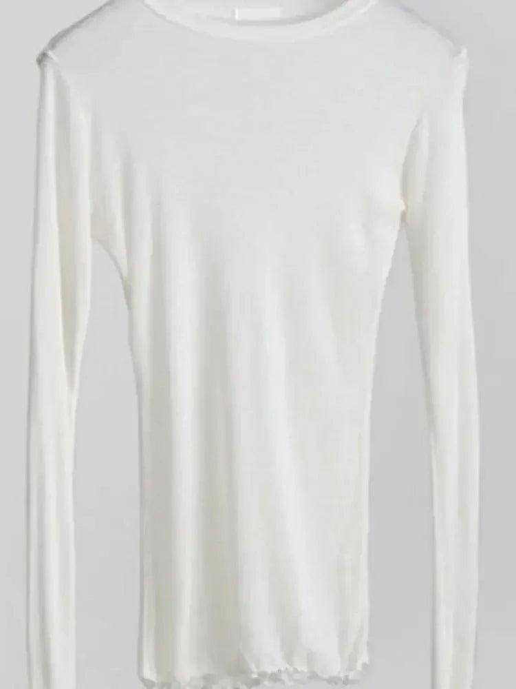 White long sleeve women's fashion top, soft knit, round neck, minimalist style