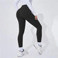 Black high-waist leggings for women, perfect for gym, yoga, or casual wear with white sneakers.
