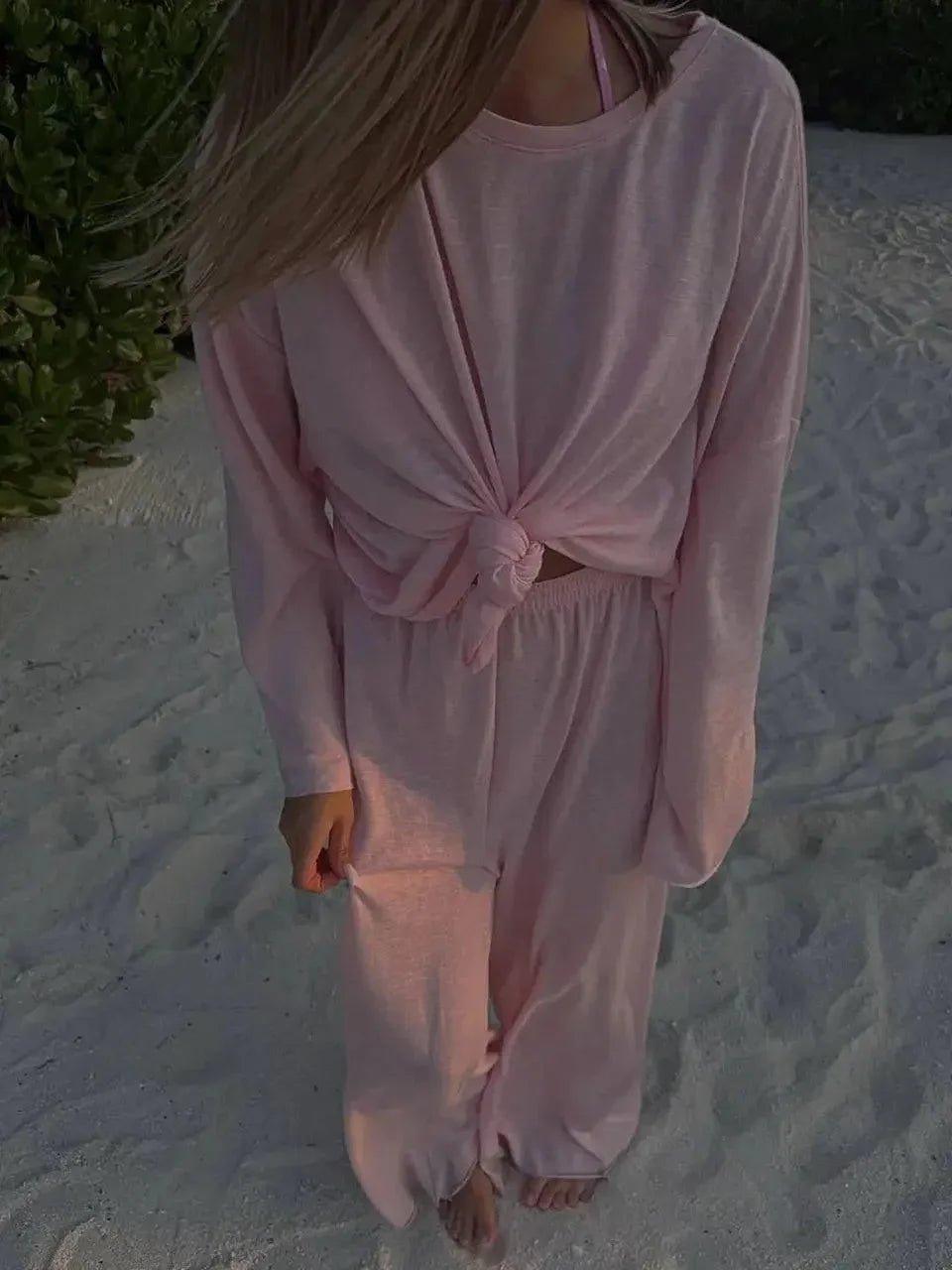 Pink knotted long sleeve lounge set on sandy beach, women's fashion