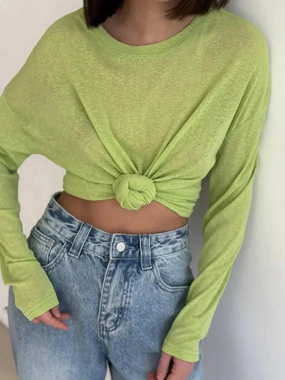 Lime green knotted crop top with long sleeves paired with high-waisted jeans, women's fashion