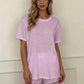 Lavender women's lounge set with lace trim shorts and relaxed tee, perfect for cozy fashion