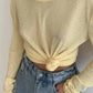 Yellow long sleeve crop top with front knot detail, paired with high waist jeans, women's fashion
