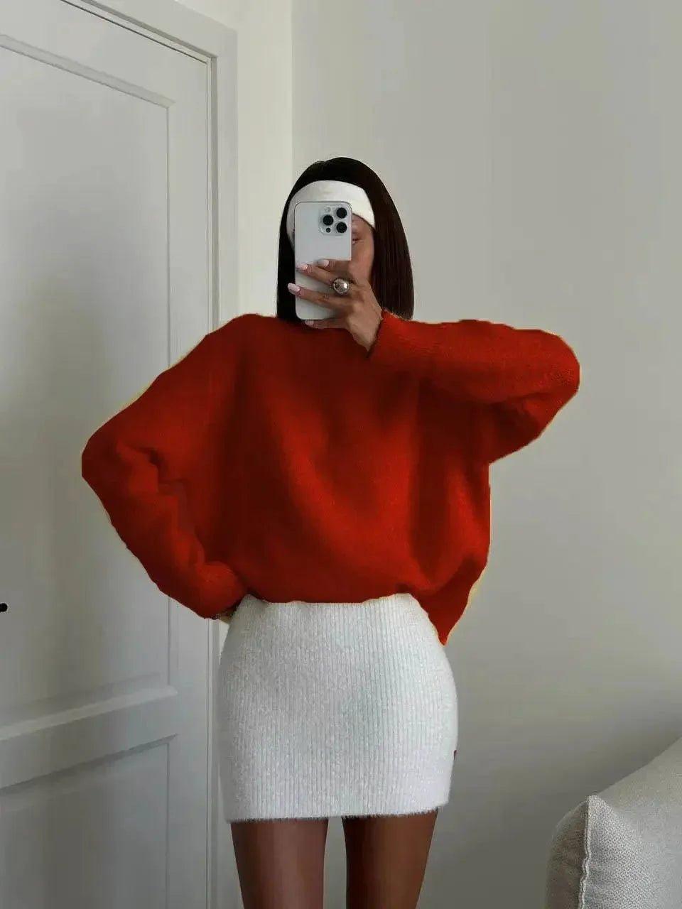 Woman in red oversized sweater and white knit mini skirt, fashion selfie
