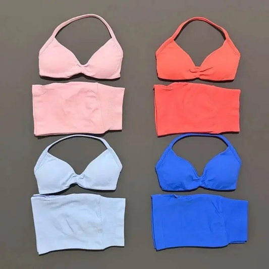 Women's fashion bras and bandeaus in pink, coral, light blue, and royal blue