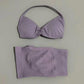 Lavender women's bikini set with halter top and high-waisted bottoms, perfect for beach fashion