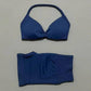 Blue women's bikini set with halter top and high-waisted bottoms