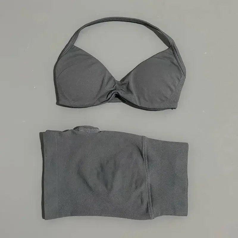 Gray women's bikini set with halter top and matching bottoms, ideal for beachwear and summer fashion